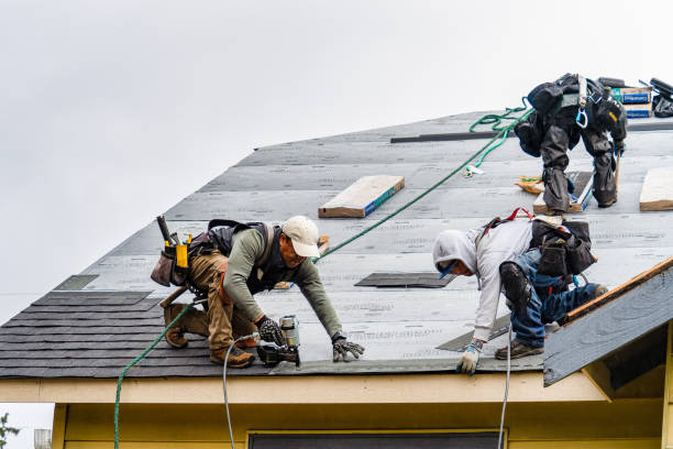 Professional Flat Roof Repair technician working in East Rockaway, NY